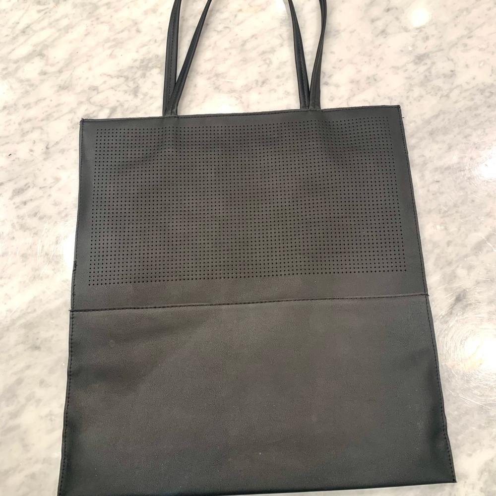 Saks Fifth Avenue tote bag. Faux leather. never used